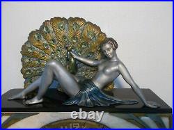 Ancienne pendule horloge sculpture art deco 1930 LIMOUSIN statue femme au paon