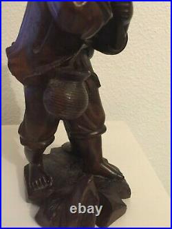 Art chinois sculpture en bois jeune garçon pêcheur poisson géant, statue, chine