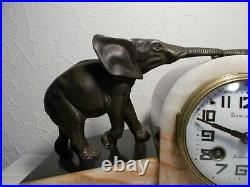 Pendule horloge art deco 1930 statue sculpture elephant en regule patine bronze