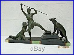Sculpture couple chasseur ours blanc statue art deco Uriano Ugo Cipriani carving